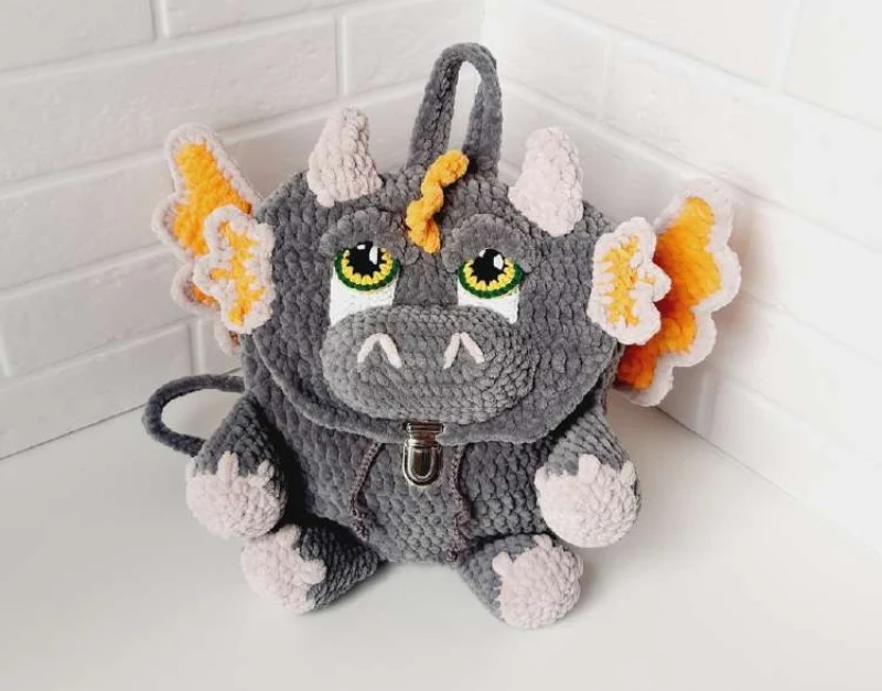 Complimentary Intermediate crochet pattern: Baby Dino Amigurumi Backpack Pattern - Simple to follow guide